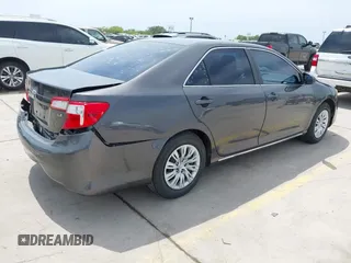 2014 Toyota Camry L with VIN 4T4BF1FKXER379158, listed as a IAAI auction lot 42050926 with 88,060 mi miles and . Bid and sale history available at DreamBid. Image 4.