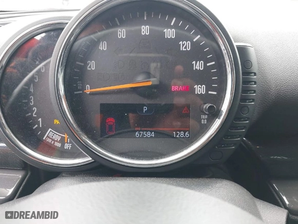 2016 MINI Cooper Clubman with VIN WMWLN5C56G2E30309, listed as a IAAI auction lot 41772501 with 67,584 mi miles. Bid and sale history available at carsss.com. Image 7.
