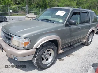 2000 Ford Explorer Eddie Bauer z VIN 1FMDU74E2YUA00568, wystawiony jako IAAI lot #42176409 z przebiegiem 150 479 mil mil oraz . Historia ofert i sprzedaży dostępna na DreamBid. Obrazek 17.