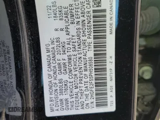 2023 Honda Civic Sport z VIN 2HGFE2F55PH508580, wystawiony jako Copart lot #53041855 z przebiegiem 59 509 mil mil oraz Szkody całkowita. Historia ofert i sprzedaży dostępna na DreamBid. Obrazek 14.