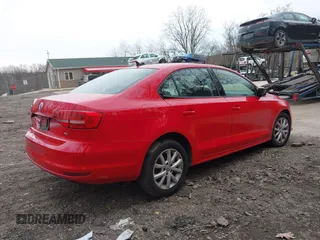 2015 Volkswagen Jetta Sedan 1.8T SE with VIN 3VWD17AJXFM303014, listed as a IAAI auction lot 41953494 with 92,145 mi miles. Bid and sale history available at carsss.com. Image 4.