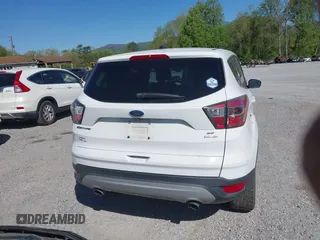 2017 Ford Escape SE with VIN 1FMCU9GD3HUA40233, listed as a IAAI auction lot 42126271 with 284,937 mi miles. Bid and sale history available at carsss.com. Image 17.