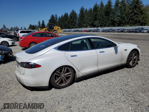 2014 Tesla Model S 60 with VIN 5YJSA1H12EFP51909, listed as a Copart auction lot 55489705 with Not Provided miles and Clean Title. Bid and sale history available at DreamBid. Image 3.