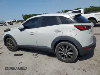 2017 Mazda CX-3 Touring z VIN JM1DKDC75H0168823, wystawiony jako Copart lot #57968955 z przebiegiem 116 231 mil mil oraz Szkoda całkowita • Salvage title. Historia ofert i sprzedaży dostępna na DreamBid. Obrazek 2.