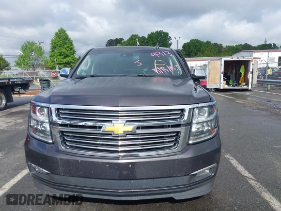 2015 Chevrolet Suburban LTZ with VIN 1GNSKKKC4FR589913, listed as a IAAI auction lot 42017190 with 216,145 mi miles. Bid and sale history available at carsss.com. Image 12.