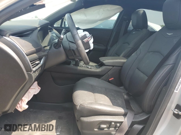 2022 Cadillac XT4 FWD Sport with VIN 1GYFZER47NF111047, listed as a Copart auction lot 50958135 with 14,448 mi miles and Salvage Title. Bid and sale history available at carsss.com. Image 7.