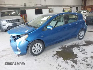 2012 Toyota Prius One with VIN JTDKDTB32C1023106, listed as a IAAI auction lot 42185223 with 210,691 mi miles. Bid and sale history available at carsss.com. Image 2.