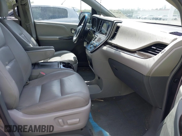 2015 Toyota Sienna XLE with VIN 5TDYK3DC3FS556859, listed as a IAAI auction lot 42161107 with 200,502 mi miles and . Bid and sale history available at DreamBid. Image 5.