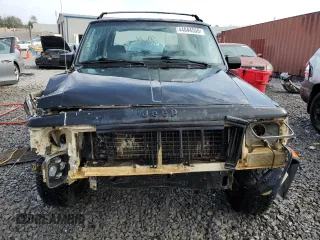 1994 Jeep Cherokee Sport with VIN 1J4FT68S0RL234669, listed as a Copart auction lot 44044555 with 282,179 mi miles and Salvage title. Bid and sale history available at DreamBid. Image 5.