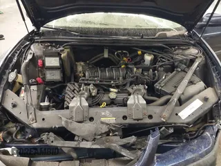 2002 Chevrolet Impala LS z VIN 2G1WH55K529142095, wystawiony jako IAAI lot #42145543 z przebiegiem 214 718 mil mil oraz . Historia ofert i sprzedaży dostępna na DreamBid. Obrazek 10.