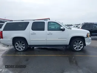 2008 Chevrolet Suburban LTZ with VIN 1GNFC16018R143195, listed as a IAAI auction lot 41577367 with 223,506 mi miles and . Bid and sale history available at DreamBid. Image 13.
