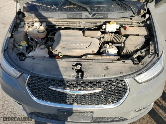 2021 Chrysler Pacifica Hybrid Touring L with VIN 2C4RC1L73MR581213, listed as a Copart auction lot 78910244 with 104,426 mi miles and Salvage Title. Bid and sale history available at carsss.com. Image 13.