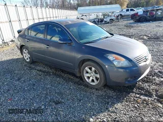 2009 Nissan Altima 2.5 with VIN 1N4AL21E99N538882, listed as a IAAI auction lot 42119130 with 154,146 mi miles. Bid and sale history available at carsss.com. Image 2.