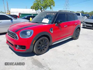 2019 MINI Countryman Cooper S with VIN WMZYT3C55K3E97750, listed as a IAAI auction lot 41844596 with 34,871 mi miles and . Bid and sale history available at DreamBid. Image 2.
