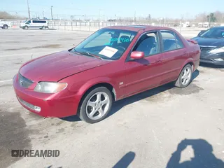 2001 Mazda Protege LX with VIN JM1BJ226310453078, listed as a IAAI auction lot 41683416 with 78,228 mi miles and . Bid and sale history available at DreamBid. Image 2.