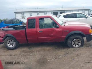 2005 Ford Ranger XL z VIN 1FTYR14UX5PA74830, wystawiony jako IAAI lot #42168030 z przebiegiem 235 021 mil mil oraz . Historia ofert i sprzedaży dostępna na DreamBid. Obrazek 13.