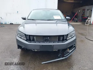 2017 Volkswagen Passat S z VIN 1VWAT7A3XHC071775, wystawiony jako IAAI lot #41775028 z przebiegiem 58 945 mil mil oraz . Historia ofert i sprzedaży dostępna na DreamBid. Obrazek 13.