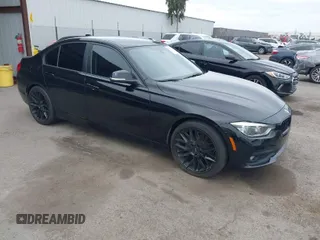 2018 BMW 3 Series 320i with VIN WBA8E1G54JNU93257, listed as a IAAI auction lot 41719141 with 144,381 mi miles. Bid and sale history available at carsss.com. Image 1.