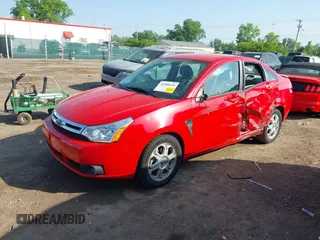 2008 Ford Focus SE z VIN 1FAHP35N08W192703, wystawiony jako IAAI lot #42280619 z przebiegiem 119 636 mil mil oraz . Historia ofert i sprzedaży dostępna na DreamBid. Obrazek 2.