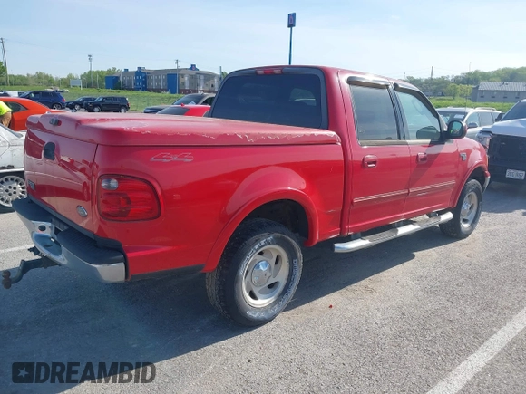 2003 Ford F-150 XLT with VIN 1FTRW08L43KD14456, listed as a IAAI auction lot 42098830 with 234,908 mi miles. Bid and sale history available at carsss.com. Image 4.