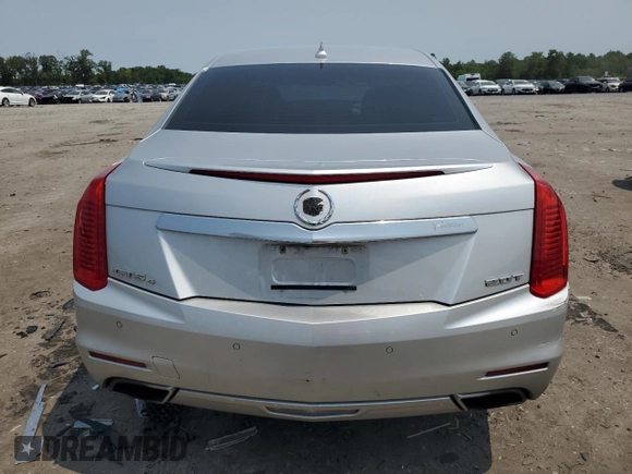 2014 Cadillac CTS Luxury AWD with VIN 1G6AX5SX5E0129143, listed as a Copart auction lot 58914015 with 131,465 mi miles and Salvage title. Bid and sale history available at DreamBid. Image 6.
