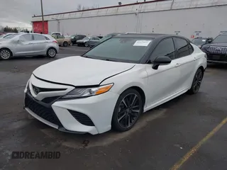 2020 Toyota Camry XSE with VIN 4T1K61AK7LU374885, listed as a IAAI auction lot 41579252 with 85,750 mi miles and . Bid and sale history available at DreamBid. Image 2.