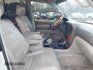 2000 Lexus LX 470 z VIN JT6HT00W9Y0103225, wystawiony jako IAAI lot #41148826 z przebiegiem 270 351 mil mil oraz . Historia ofert i sprzedaży dostępna na DreamBid. Obrazek 5.