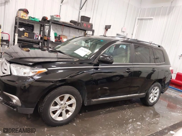 2012 Toyota Highlander with VIN 5TDBK3EH2CS163379, listed as a IAAI auction lot 41807409 with 202,554 mi miles. Bid and sale history available at carsss.com. Image 14.