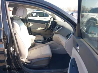 2016 Hyundai Tucson Limited with VIN KM8J33A27GU237225, listed as a IAAI auction lot 41223497 with 158,986 mi miles. Bid and sale history available at carsss.com. Image 5.