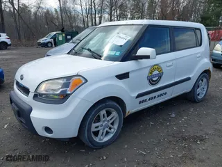 2010 Kia Soul + with VIN KNDJT2A22A7701882, listed as a IAAI auction lot 42064314 with 174,010 mi miles. Bid and sale history available at carsss.com. Image 2.