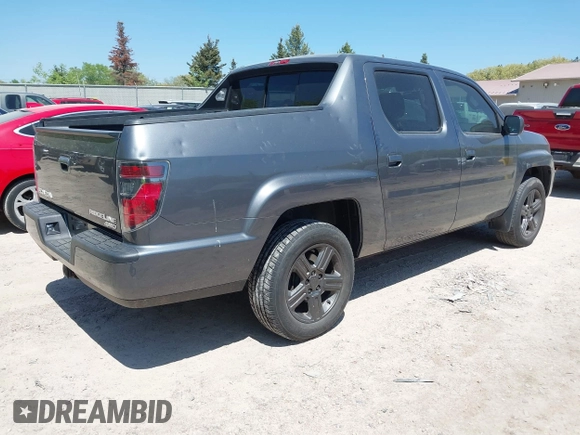 2013 Honda Ridgeline RTL with VIN 5FPYK1F58DB016600, listed as a IAAI auction lot 42237719 with 86,034 mi miles and . Bid and sale history available at DreamBid. Image 4.