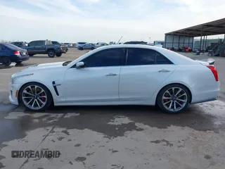 2017 Cadillac CTS-V z VIN 1G6A15S64H0137358, wystawiony jako IAAI lot #41336455 z przebiegiem 76 367 mil mil oraz . Historia ofert i sprzedaży dostępna na DreamBid. Obrazek 14.