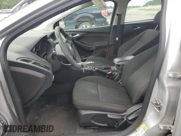 2017 Ford Focus SE with VIN 1FADP3F20HL300273, listed as a Copart auction lot 61489455 with 131,097 mi miles and Clean title. Bid and sale history available at DreamBid. Image 7.