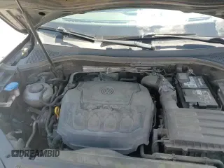 2018 Volkswagen Tiguan S с VIN 3VV1B7AX9JM015504, выставлен на аукционе Copart как лот 71401275 с пробегом 142 417 миль миль и Списание • Salvage title. История ставок и продаж доступна на DreamBid. Изображение 14.