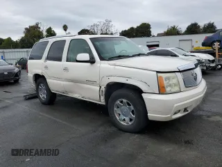 2003 Cadillac Escalade z VIN 1GYEC63T93R208877, wystawiony jako Copart lot #83894424 z przebiegiem 160 530 mil mil oraz Szkoda całkowita • Salvage title. Historia ofert i sprzedaży dostępna na DreamBid. Obrazek 4.