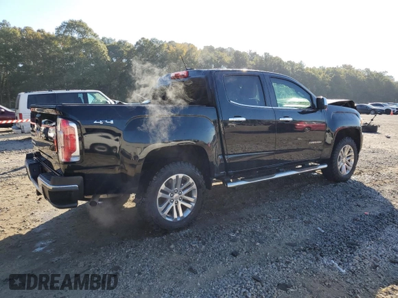 2018 GMC Canyon 4WD SLT with VIN 1GTG6DEN4J1296628, listed as a Copart auction lot 77135484 with 74,486 mi miles and Salvage Title. Bid and sale history available at carsss.com. Image 3.