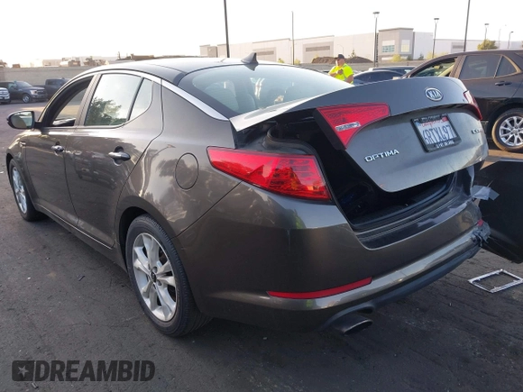 2011 Kia Optima EX with VIN KNAGN4A68B5086204, listed as a IAAI auction lot 41976276 with 177,439 mi miles and . Bid and sale history available at carsss.com. Image 3.