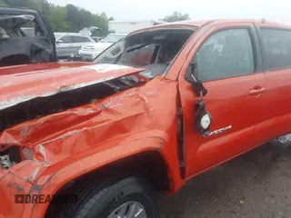 2017 Toyota Tacoma SR5 with VIN 5TFDZ5BN0HX015629, listed as a IAAI auction lot 42002103 with 127,829 mi miles. Bid and sale history available at carsss.com. Image 13.
