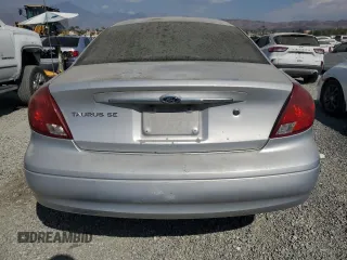 2002 Ford Taurus SE with VIN 1FAFP53272G198088, listed as a Copart auction lot 69810014 with 152,794 mi miles and Clean title. Bid and sale history available at DreamBid. Image 6.
