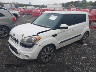 2013 Kia Soul ! with VIN KNDJT2A64D7570378, listed as a IAAI auction lot 41955532 with 214,564 mi miles. Bid and sale history available at carsss.com. Image 2.
