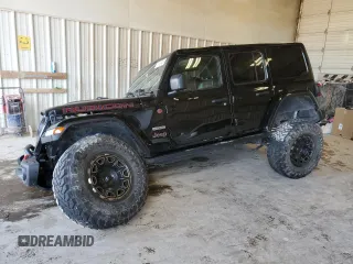 2020 Jeep Wrangler Unlimited Recon with VIN 1C4HJXFN0LW263201, listed as a Copart auction lot 79129424 with 73,405 mi miles and Salvage title. Bid and sale history available at DreamBid. Image 1.