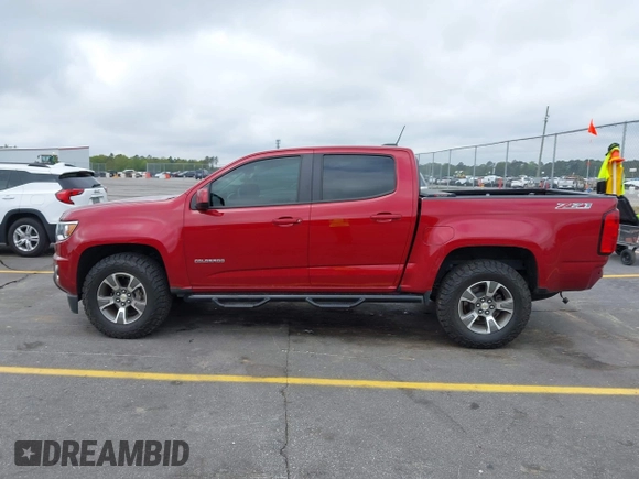 2020 Chevrolet Colorado 4WD Z71 with VIN 1GCGTDEN3L1132444, listed as a IAAI auction lot 41898911 with 65,493 mi miles and . Bid and sale history available at DreamBid. Image 14.