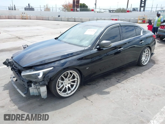 2014 Infiniti Q50 Premium z VIN JN1BV7AP3EM690571, wystawiony jako IAAI lot #42136354 z przebiegiem 191 969 mil mil oraz . Historia ofert i sprzedaży dostępna na DreamBid. Obrazek 18.