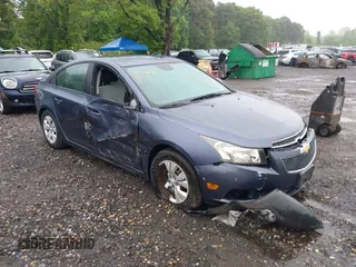 2014 Chevrolet Cruze LS z VIN 1G1PA5SG9E7111737, wystawiony jako IAAI lot #42344648 z przebiegiem 45 642 mil mil oraz . Historia ofert i sprzedaży dostępna na DreamBid. Obrazek 1.