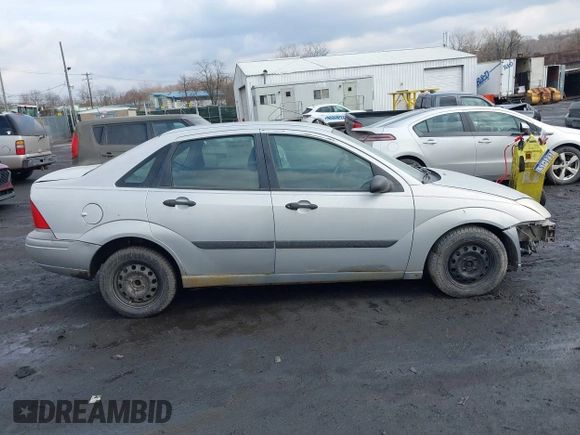 2001 Ford Focus LX with VIN 1FAFP33P31W297608, listed as a IAAI auction lot 41663965 with 142,898 mi miles and . Bid and sale history available at carsss.com. Image 13.
