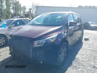 2016 Kia Sedona LX with VIN KNDMB5C14G6163836, listed as a IAAI auction lot 41578462 with 153,315 mi miles. Bid and sale history available at carsss.com. Image 2.