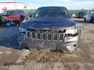 2019 Jeep Grand Cherokee Altitude with VIN 1C4RJEAG2KC698822, listed as a IAAI auction lot 41476562 with 128,035 mi miles and . Bid and sale history available at DreamBid. Image 6.