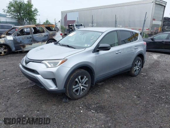 2018 Toyota RAV4 LE with VIN JTMBFREV8JJ200930, listed as a IAAI auction lot 42524876 with 88,015 mi miles and . Bid and sale history available at DreamBid. Image 2.