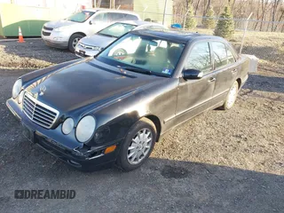 2000 Mercedes-Benz E-Class with VIN WDBJF65J1YB058351, listed as a IAAI auction lot 41834603 with 100,525 mi miles. Bid and sale history available at carsss.com. Image 2.