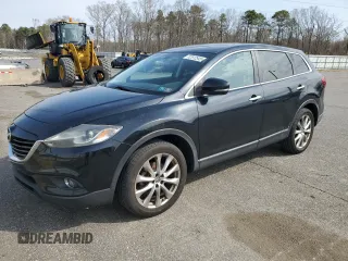 2014 Mazda CX-9 Grand Touring with VIN JM3TB3DV8E0428962, listed as a Copart auction lot 52512545 with 104,819 mi miles and Clean Title. Bid and sale history available at DreamBid. Image 1.